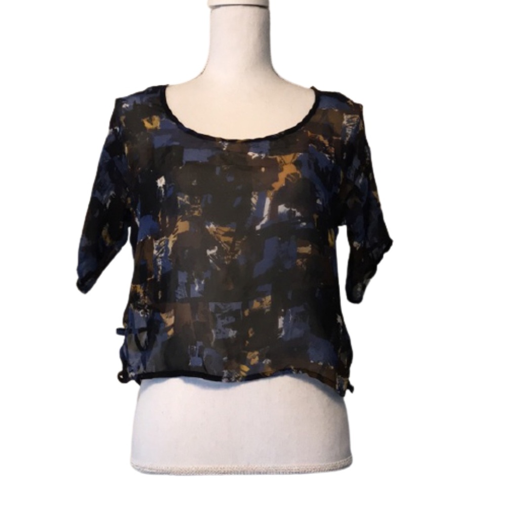 HAPPENING IN THE PRESENT sheer cris cross crop top